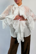 Camicia bianca manica a sbuffo