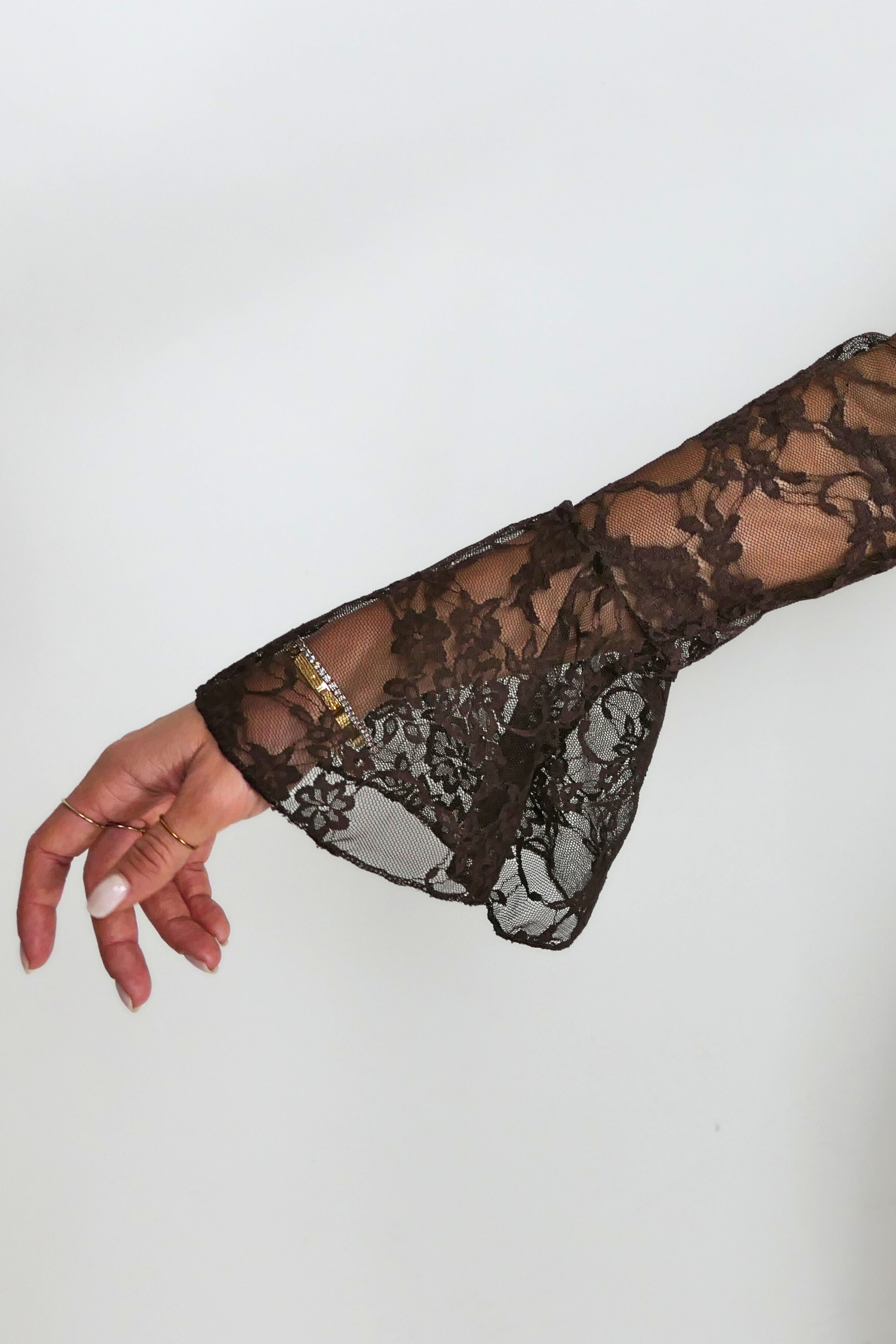Maglia pizzo con manica a sbuffo